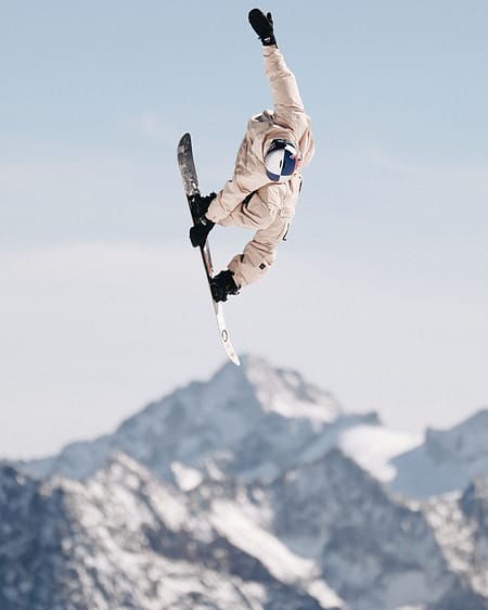 Image 1 of 2 - Vlad Khadarin Snowboarding